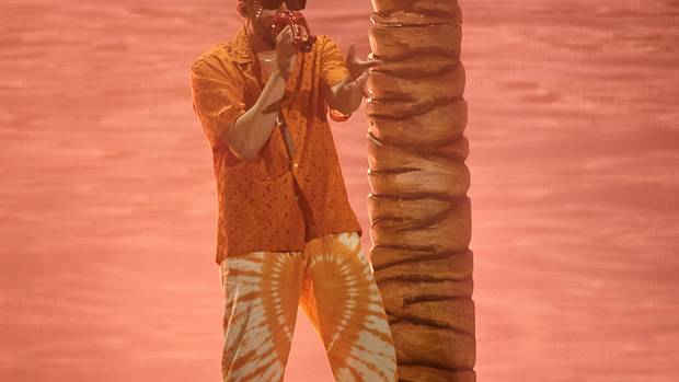 Bad Bunny performs during a concert.