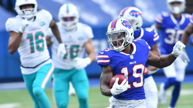 Buffalo Bills wide receiver Isaiah McKenzie (19) returns a punt for a touchdown against the Miami Dolphins last January.