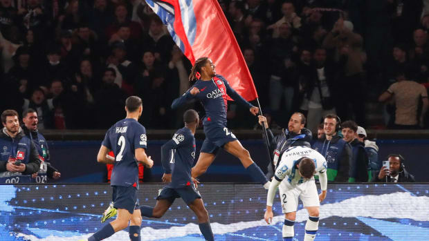 Bradley Barcola pictured (center) punching the air after scoring his first Champions League goal in Paris Saint-Germain's 2-0 win over Real Sociedad in February 2024