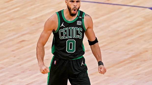 Jayson Tatum celebrates during a game.
