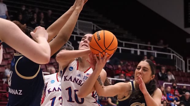 Mar 18, 2022; Stanford, California, USA; Kansas Jayhawks forward Ioanna Chatzileonti (10) is fouled by Georgia Tech Yellow Jackets guard Sarah Bates (3) during the first quarter at Maples Pavilion. Mandatory Credit: Kelley L Cox-USA TODAY Sports