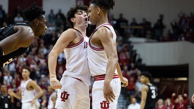 Indiana Hoosiers guard Trey Galloway (32) and forward Malik Reneau (5) celebrate in the second half against Michigan State.