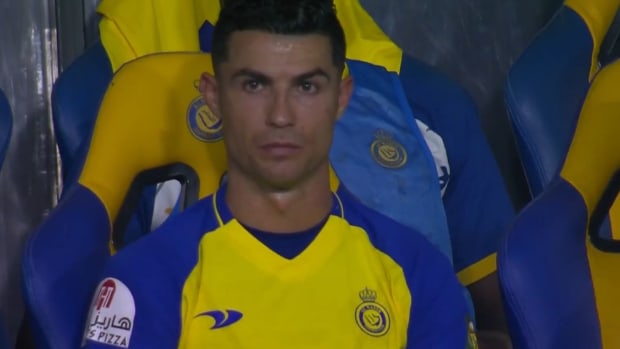 Cristiano Ronaldo pictured on the bench after being subbed off late on in Al Nassr's 3-1 win over Abha in March 2023