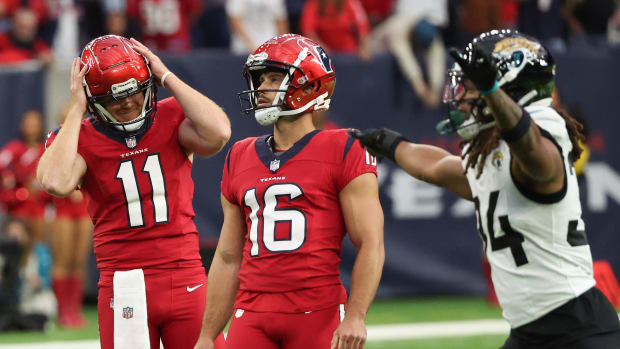 Texans punter and place holder Cameron Johnston (11) reacts after Houston Texans place kicker Matt Ammendola (16) missed a 57-yard field goal against the Jacksonville Jaguars.
