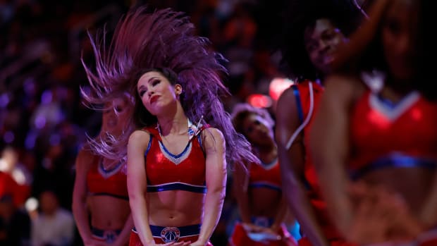 Members of the Washington Wizards Dancers dance during a timeout against the Dallas Mavericks in the second quarter at Capital One Arena.