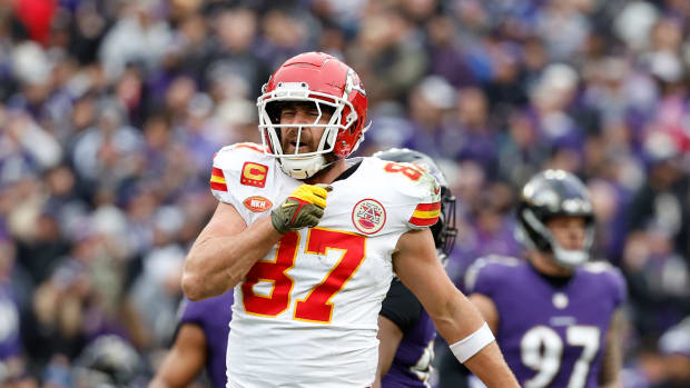 Kansas City Chiefs tight end Travis Kelce celebrates after scoring a touchdown against the Baltimore Ravens.