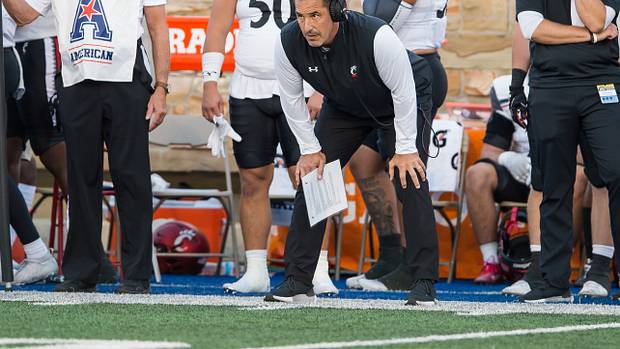 Cincinnati head coach Luke Fickell watching his team from the sidelines