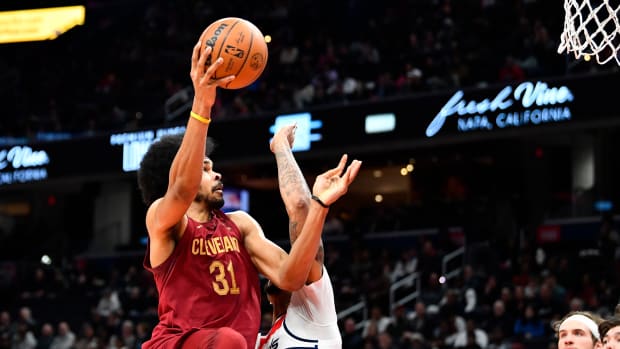 Cleveland Cavaliers center Jarrett Allen (31) shoots over Washington Wizards center Daniel Gafford (21) during the first half at Capital One Arena.