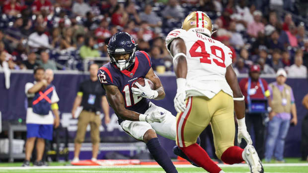 Houston Texans receiver Nico Collins (12) makes a play against the San Francisco 49ers in the preseason.