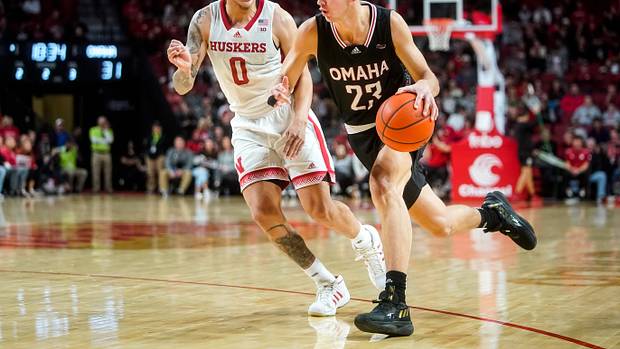 Nebraska-Omaha Mavericks forward Frankie Fidler (23) drives against Nebraska Cornhuskers guard C.J. Wilcher (0) during the second half at Pinnacle Bank Arena.