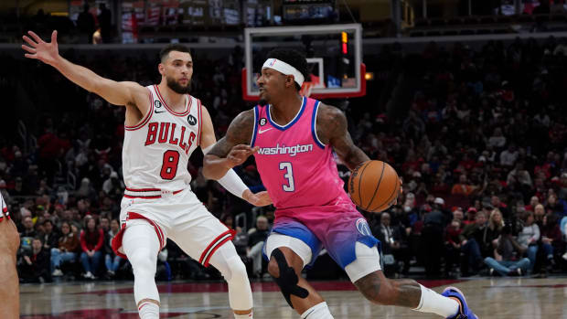 Feb 26, 2023; Chicago, Illinois, USA; Chicago Bulls guard Zach LaVine (8) defends Washington Wizards guard Bradley Beal (3) during the first half at United Center.