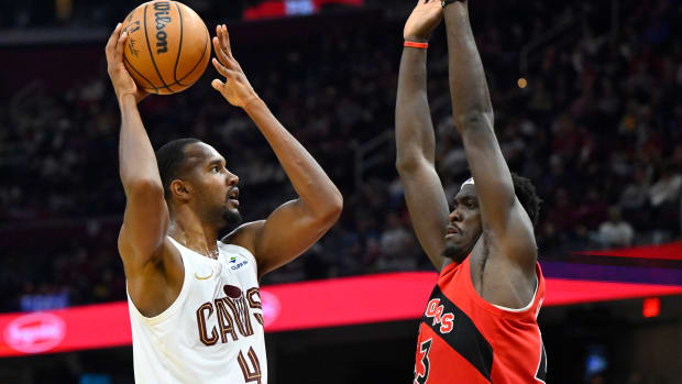 Nov 26, 2023; Cleveland, Ohio, USA; Cleveland Cavaliers forward Evan Mobley (4) shoots while guarded by Toronto Raptors forward Pascal Siakam (43) in the second quarter at Rocket Mortgage FieldHouse.