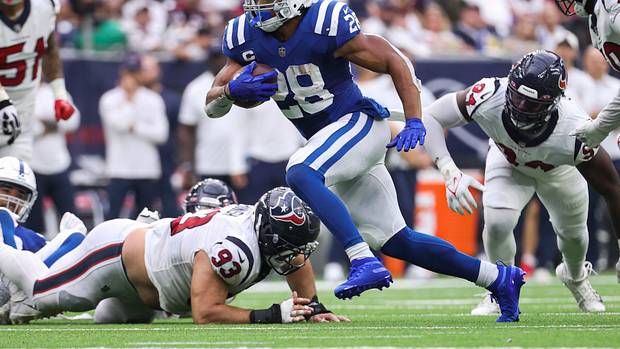 Indianapolis Colts running back Jonathan Taylor runs open for a first down against the Houston Texans