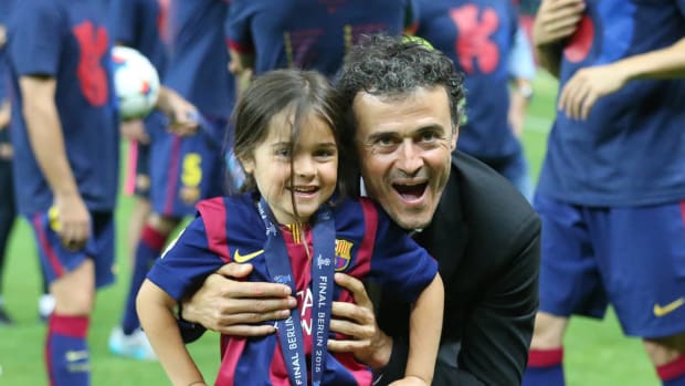 Luis Enrique pictured celebrating with his daughter Xana in 2015 after winning the UEFA Champions League as manager of Barcelona