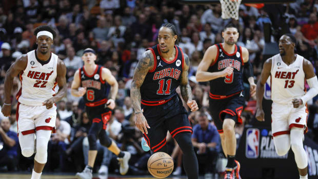 Chicago Bulls forward DeMar DeRozan (11) dribbles the basketball during the third quarter against the Miami Heat at Kaseya Center.
