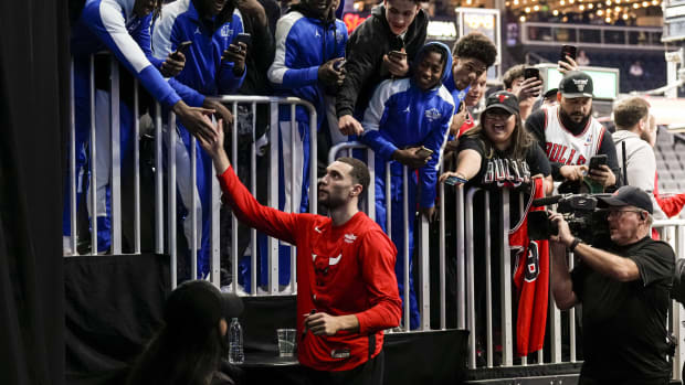 Chicago Bulls guard Zach LaVine (8) shakes hands with fans prior to the game against the Atlanta Hawks