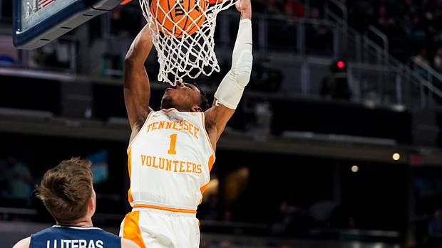 Tennessee Volunteers guard Kennedy Chandler (1) reacts as he dunks in the 2022 NCAA Tournament.