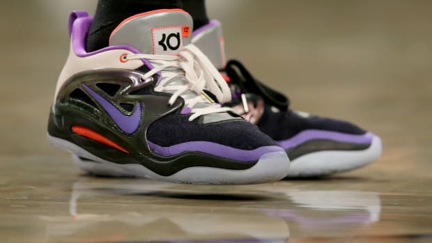 View of Kevin Durant's black and purple Nike shoes.
