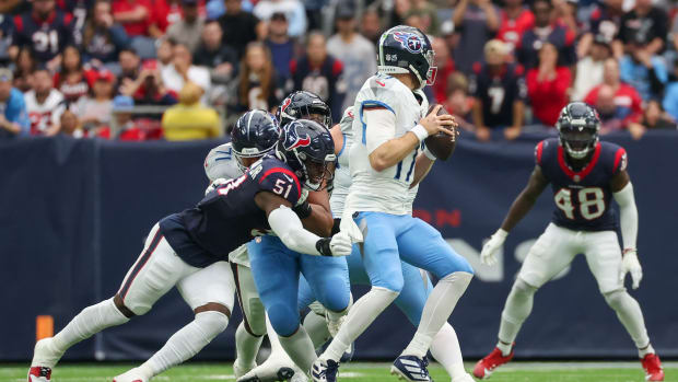 Titans quarterback Ryan Tannehill (17) is sacked by Houston Texans defensive end Will Anderson Jr. (51) in the second quarter at NRG Stadium.