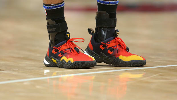 Atlanta Hawks guard Trae Young wears the Adidas Trae Young 1 'Hawks' sneakers against the Philadelphia 76ers on December 3, 2021.