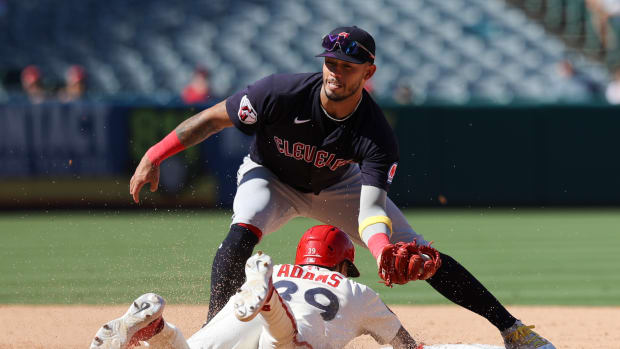 Sep 10, 2023; Anaheim, California, USA; Cleveland Guardians shortstop Gabriel Arias (13) tags out Los Angeles Angels center fielder Jordyn Adams (39) during the eighth inning at Angel Stadium. Mandatory Credit: Jessica Alcheh-USA TODAY Sports