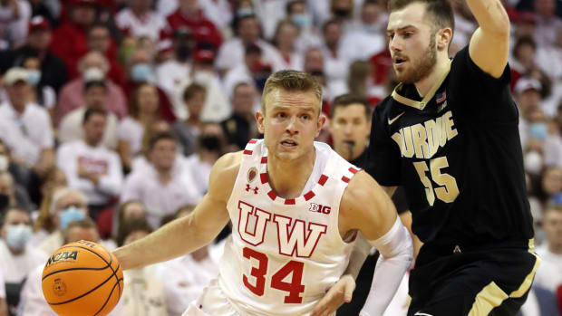 Wisconsin guard Brad Davison drives to the hoop against Purdue (Credit: Mary Langenfeld-USA TODAY Sports)