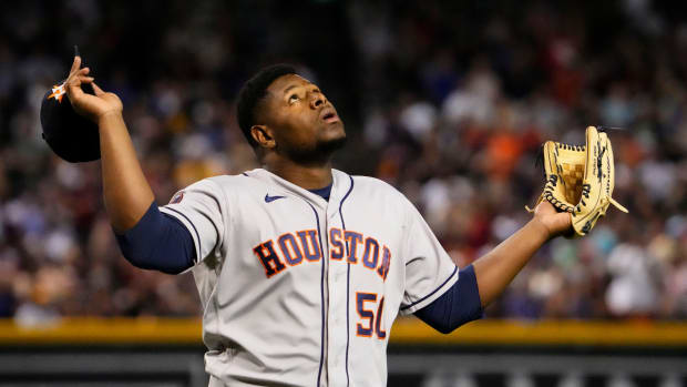 Sep 30, 2023; Phoenix, AZ, USA; Houston Astros relief pitcher Hector Neris (50) reacts after striking out Arizona Diamondbacks Ketel Marte (4) with the bases loaded to end the seventh inning at Chase Field. Mandatory Credit: Rob Schumacher-Arizona Republic  