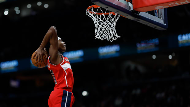 Washington Wizards guard Bilal Coulibaly (0) dunks the ball against the Milwaukee Bucks in the second quarter at Capital One Arena. 