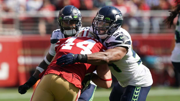 Seattle Seahawks middle linebacker Bobby Wagner (54) tackles San Francisco 49ers fullback Kyle Juszczyk (44) during the second quarter at Levi's Stadium.