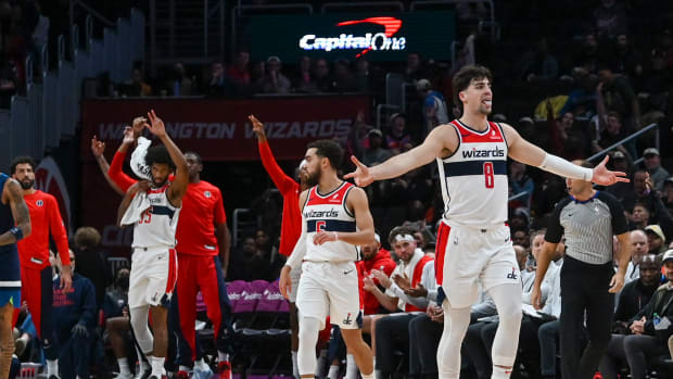 Washington Wizards forward Deni Avdija (8) reacts after making a three point basket during the fist half at Capital One Arena.