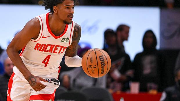 Rockets guard Jalen Green (4) dribbles up the court during the second half against the Washington Wizards at Capital One Arena.