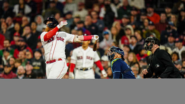 Sep 26, 2023; Boston, Massachusetts, USA; Boston Red Sox designated hitter Justin Turner (2) singles to center field to drive in a run against the Tampa Bay Rays in the seventh inning at Fenway Park. Mandatory Credit: David Butler II-USA TODAY Sports  