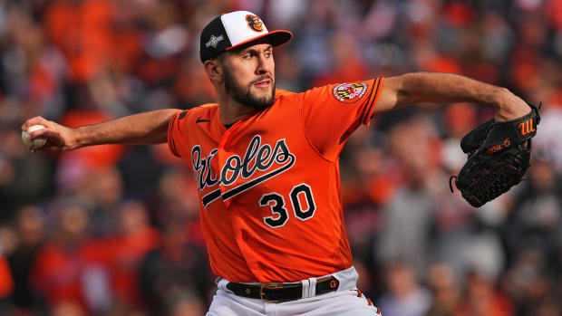 Oct 8, 2023; Baltimore, Maryland, USA; Baltimore Orioles starting pitcher Grayson Rodriguez (30) pitches during the first inning against the Texas Rangers during game two of the ALDS for the 2023 MLB playoffs at Oriole Park at Camden Yards.