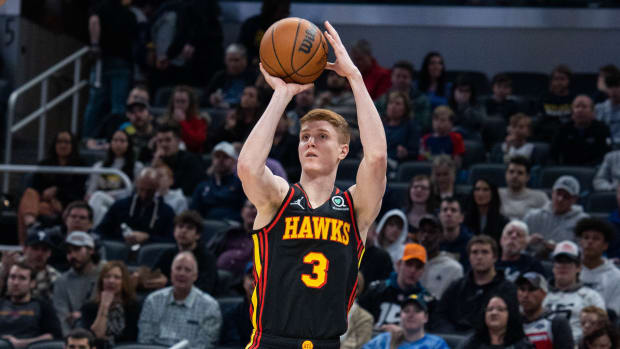 Mar 28, 2022; Indianapolis, Indiana, USA; Atlanta Hawks guard Kevin Huerter (3) shoots the ball in the first half against the Indiana Pacers at Gainbridge Fieldhouse.
