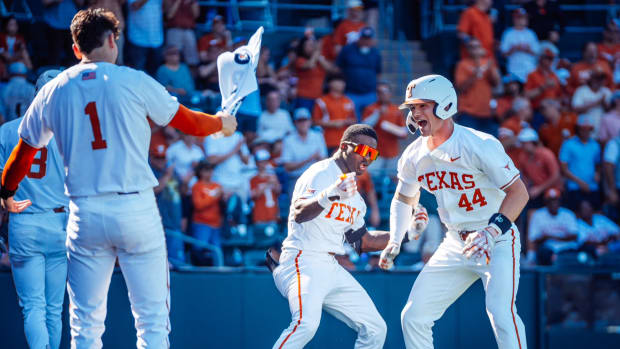 Texas baseball players celebrate