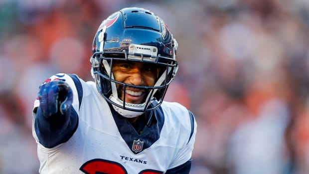 Texans' safety DeAndre Houston-Carson reacts after intercepting the ball against the Cincinnati Bengals in the second half at Paycor Stadium.