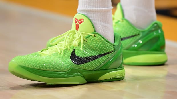 Los Angeles Lakers guard Kobe Bryant's green and red Nike sneakers.