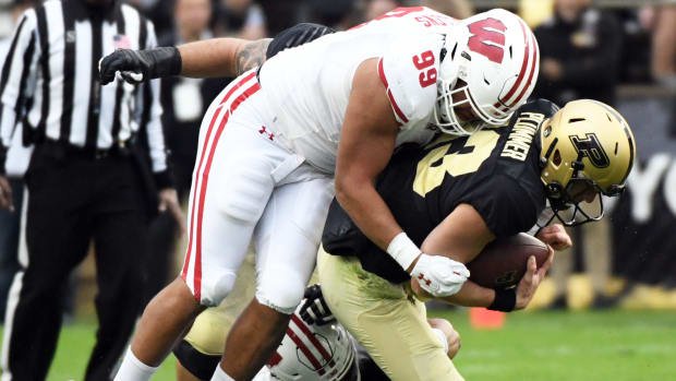 Wisconsin defensive lineman Isaiah Mullens with a sack against Purdue.