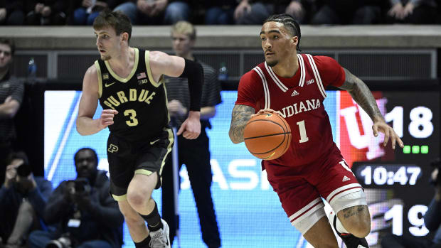 Indiana Hoosiers guard Jalen Hood-Schifino (1) dribbles the ball against Purdue Boilermakers guard Braden Smith (3) during the first half at Mackey Arena.