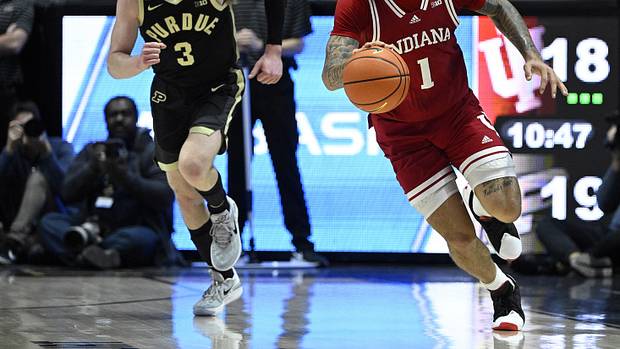 Indiana Hoosiers guard Jalen Hood-Schifino (1) dribbles the ball against Purdue Boilermakers guard Braden Smith (3) during the first half at Mackey Arena.