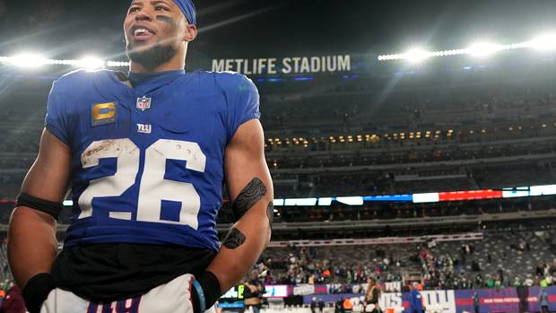 New York Giants running back Saquon Barkley (26) is shown on the field after the game, Sunday, January 7, 2024.