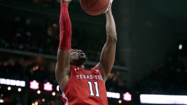 Mar 12, 2022; Kansas City, MO, USA; Texas Tech Red Raiders forward Bryson Williams (11) dunks during the second half against the Kansas Jayhawks at T-Mobile Center. Mandatory Credit: William Purnell-USA TODAY Sports