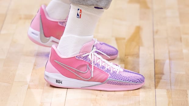 Phoenix Suns center Jusuf Nurkic's pink and white Nike sneakers.