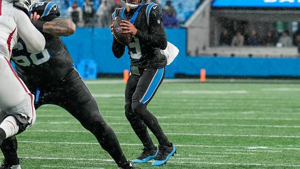 Carolina Panthers quarterback Bryce Young looks for a pass against the Atlanta Falcons.