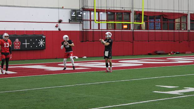 True freshman quarterback Myles Burkett throwing in practice.