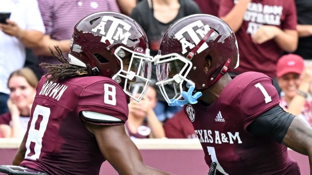 Texas A&M Aggies wide receiver Yulkeith Brown (8) celebrates a touchdown with wide receiver Evan Stewart (1) during the first quarter against the Sam Houston State Bearkats at Kyle Field.