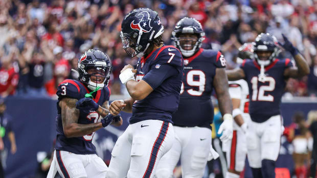 Houston Texans quarterback C.J. Stroud (7) celebrates after scoring a two-point conversion during the fourth quarter against the Tampa Bay Buccaneers at NRG Stadium.