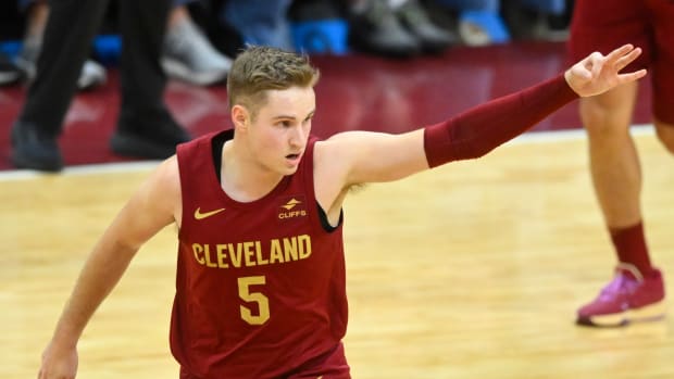 Dec 20, 2023; Cleveland, Ohio, USA; Cleveland Cavaliers guard Sam Merrill (5) celebrates his three-point basket in the fourth quarter against the Utah Jazz at Rocket Mortgage FieldHouse.