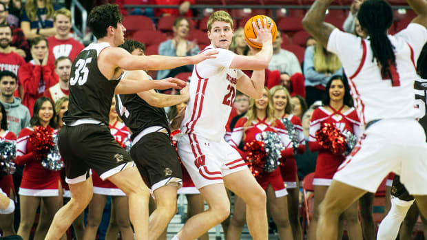 Steven Crowl looking to pass the basketball against Lehigh.