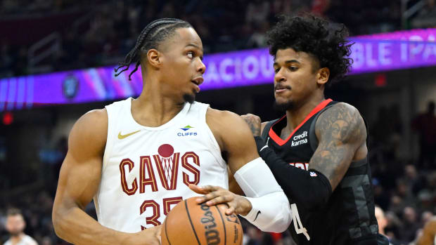 Dec 18, 2023; Cleveland, Ohio, USA; Houston Rockets guard Jalen Green (4) defends Cleveland Cavaliers forward Isaac Okoro (35) in the second quarter at Rocket Mortgage FieldHouse.